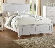 White Bed Frame With a High Headboard