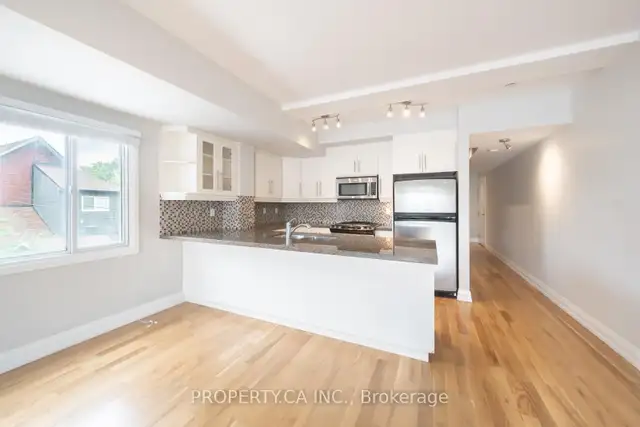 Annex condo for sale — across from Loblaws on Dupont, bus at you