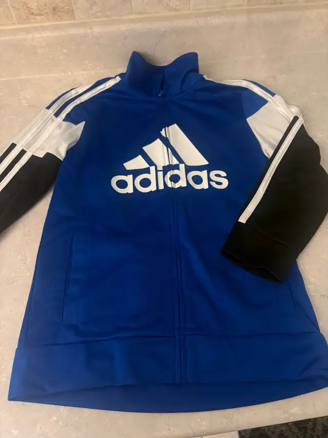 brand new Adidas track top in size 6