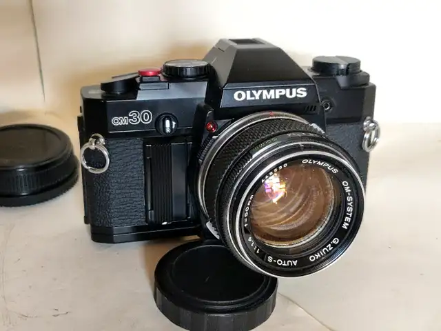 Black Olympus OM30 / 50mm f1.4