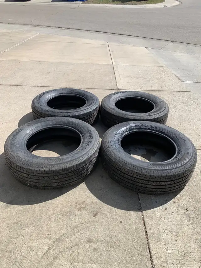 4 Yokohama all season tires 245/70/18. Tires are like new