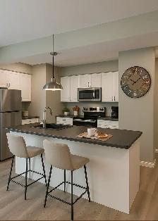 Modern 2-Bedroom Main Floor | Garage Parking, Laundry & Balcony - Photo 2