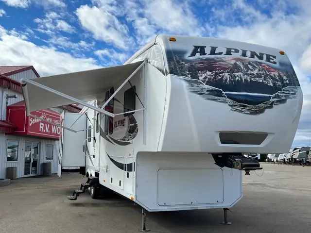 2011 KEYSTONE ALPINE 3220RL, SPACIOUS, LIXURIOUS.