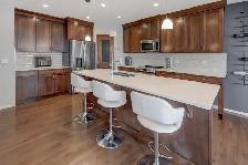 UPDATED PANORAMA HILLS HOME WITH A BASEMENT KITCHENETTE FOR SALE - Photo 2