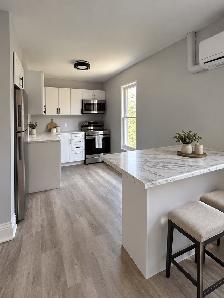 Modern 2-Bedroom Upper Unit | In-Suite Laundry & Parking – Peter