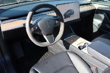 2023 Tesla Model 3 - Photo 9