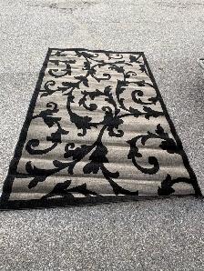 Free delivery used Black and Grey Floral Area Rug