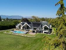Gated 5.5-Acre SE Kelowna Estate with Pool, Shop & Legal Suite