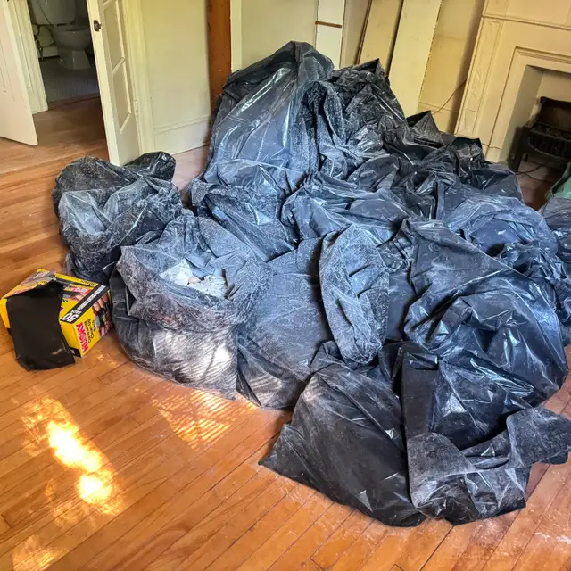 GARBAGE bags of gyprock, 30 to 40 bags half full, easier carry