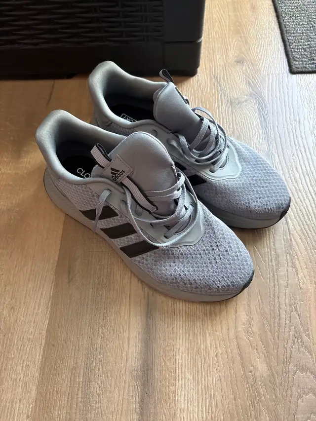 Men’s Adidas running shoes..
