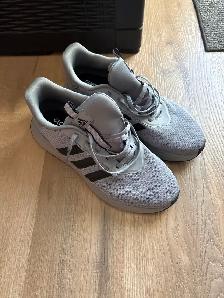 Men’s Adidas running shoes..