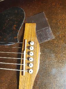 The guitar Shoppe Calgary Bone nut and saddle replacement - Photo 3
