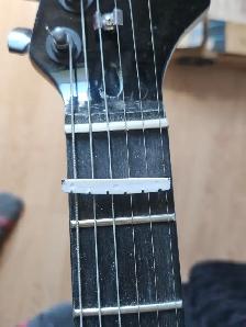 The guitar Shoppe Calgary Bone nut and saddle replacement - Photo 9
