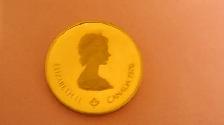 Canada $100 dollars 1976  Gold coin  22 K (MINT)