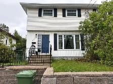Spacious 3-bedroom duplex with yard, deck and driveway parking
