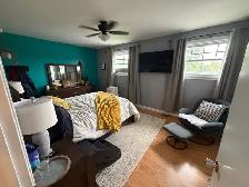 Spacious 3-bedroom duplex with yard, deck and driveway parking - Photo 9