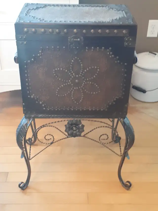 Vintage leather chest on cast iron base