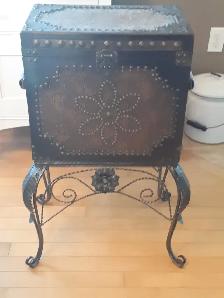 Vintage leather chest on cast iron base