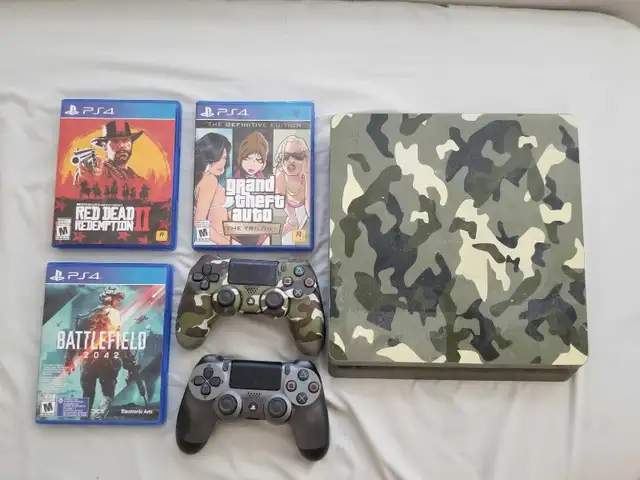PS4 1TB  with two controllers and 13 games price to sell