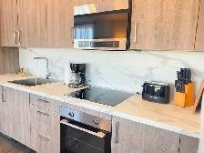 Modern 2-Bedroom, 2-Bathroom Condo in Niagara Falls - Photo 3