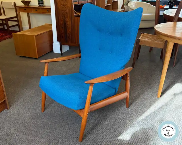 Exquisite Mid-Century Teak Reclining Armchair at Charmaine's