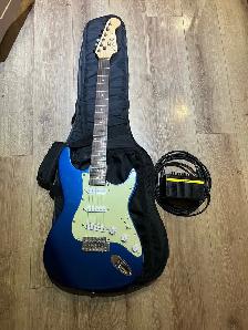 Academy Strat style electric guitar w/  gig bag and practice amp