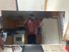 55 inch Philips/Roku tv with sound bar and wall mount