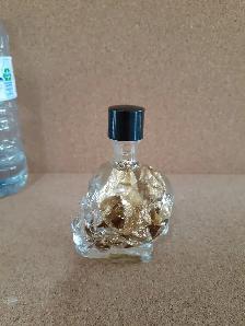 Leaf-gold in crystal skull - Photo 2