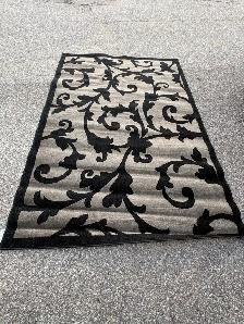 Free delivery used Black and Grey Floral Area Rug - Photo 5