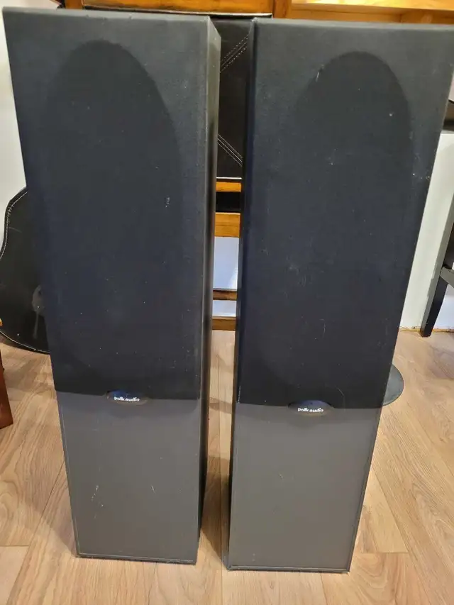 pair of Polk Audio floor standing speakers