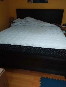 Newer king sized bed with mattress, box spring, and back board. - Photo 4