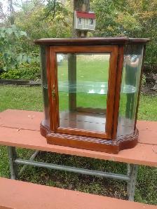 Beautiful beveled glass display cabinet with lights