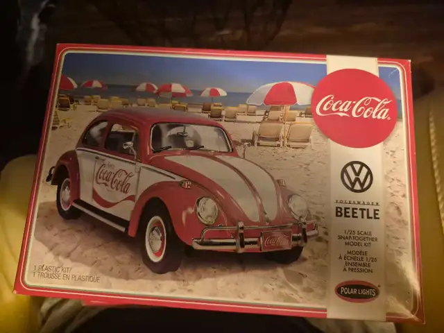 2 Coca-Cola plastic car models