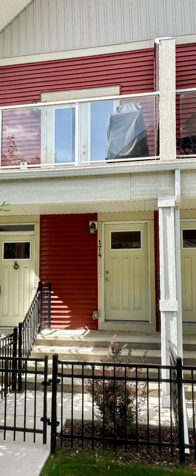 Townhouse in lake community, Auburn Bay with garage and balcony
