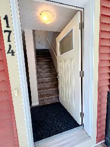 Townhouse in lake community, Auburn Bay with garage and balcony - Photo 3