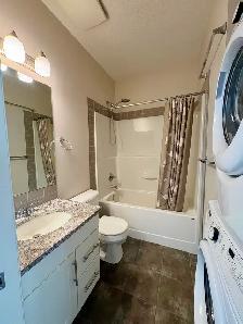 Townhouse in lake community, Auburn Bay with garage and balcony - Photo 5