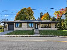 À VENDRE À LÉVIS — PLAIN-PIED LUMINEUX AVEC GARAGE ET VUE PARTIE