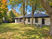 À VENDRE À LÉVIS — PLAIN-PIED LUMINEUX AVEC GARAGE ET VUE PARTIE - Photo 13