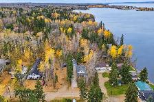 0.169 Acre Isle Lake Lot with Lake View 2 Bed Home and Dock