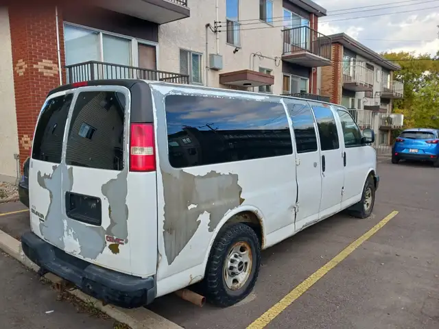 2009 White GMC Savana Van -Whyte Ave Area
