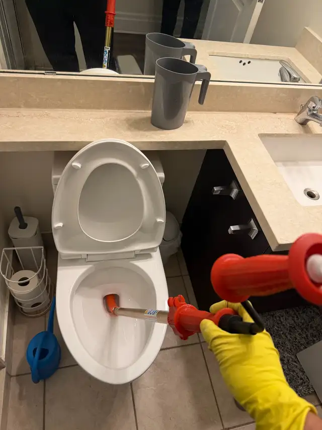 Unclogging Toilet