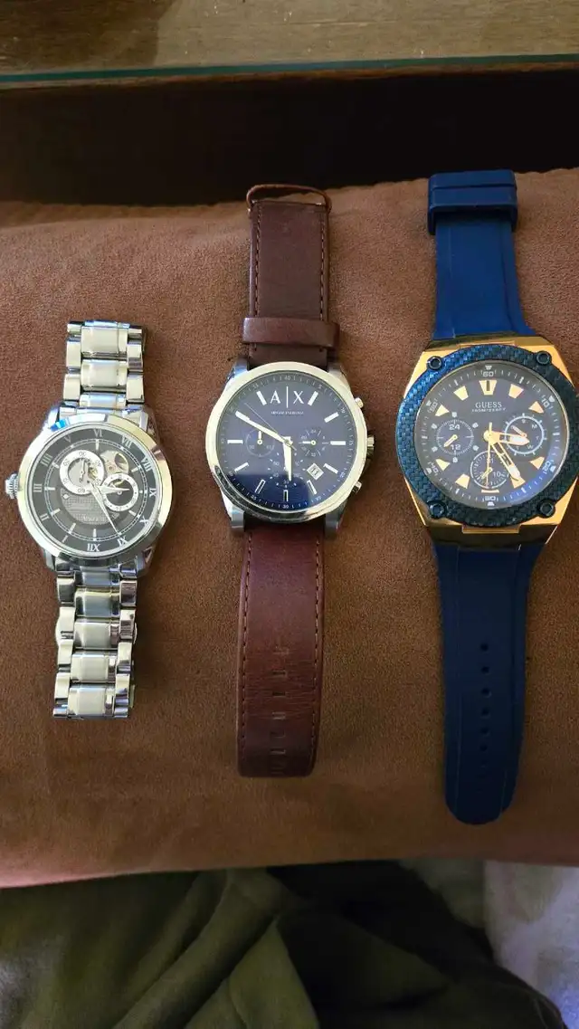 Bulova, Armani Exchange, and a guess watch