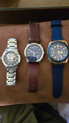 Bulova, Armani Exchange, and a guess watch
