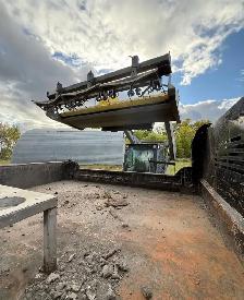 Skidsteer mobile magnetizing & tandem end dump truck services - Photo 3