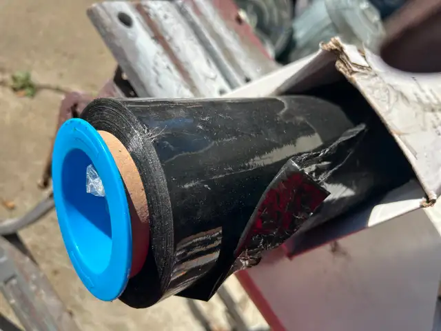 ONE FULL 1500 FT. ROLL OF BLACK STRECH FILM