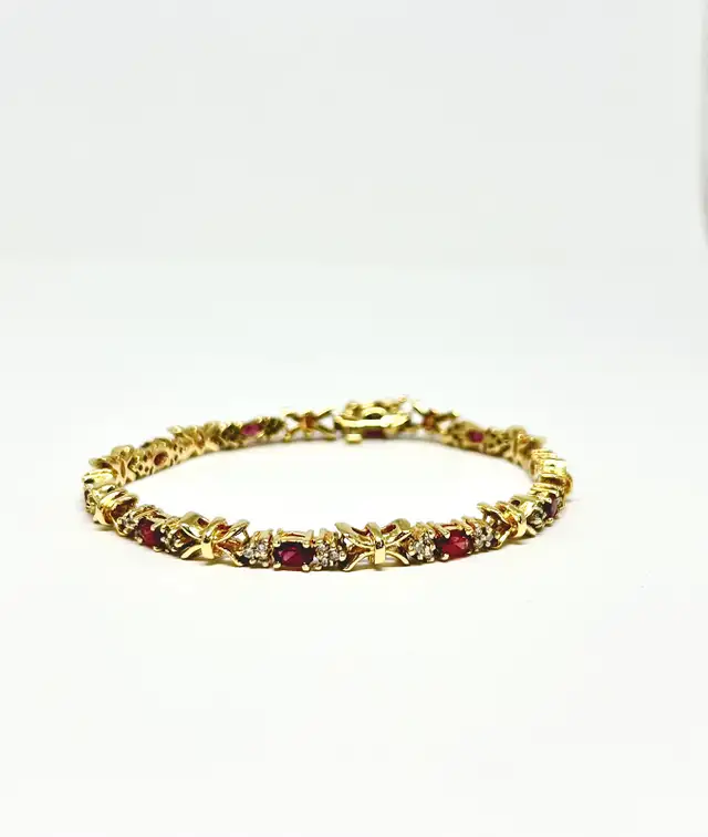 14k Oval Cut Garnet Diamond Bracelet