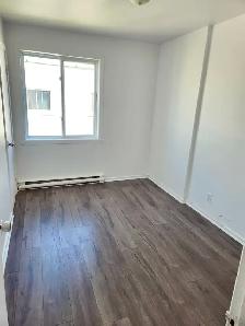 Grand 4 ½ rénové au 2e étage – près de toutes les commodités - Photo 2