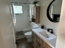 # Beautiful Furnished 2-Bedroom Upper Suite with Modern Kitchen - Photo 9