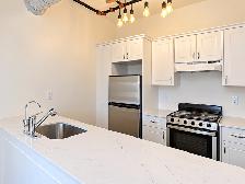 Beautiful 1-Bedroom Loft | Exposed Brick & Scenic Views | Lakefi - Photo 3