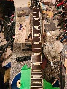 The Guitar Shoppe Calgary fret leveling - Photo 6